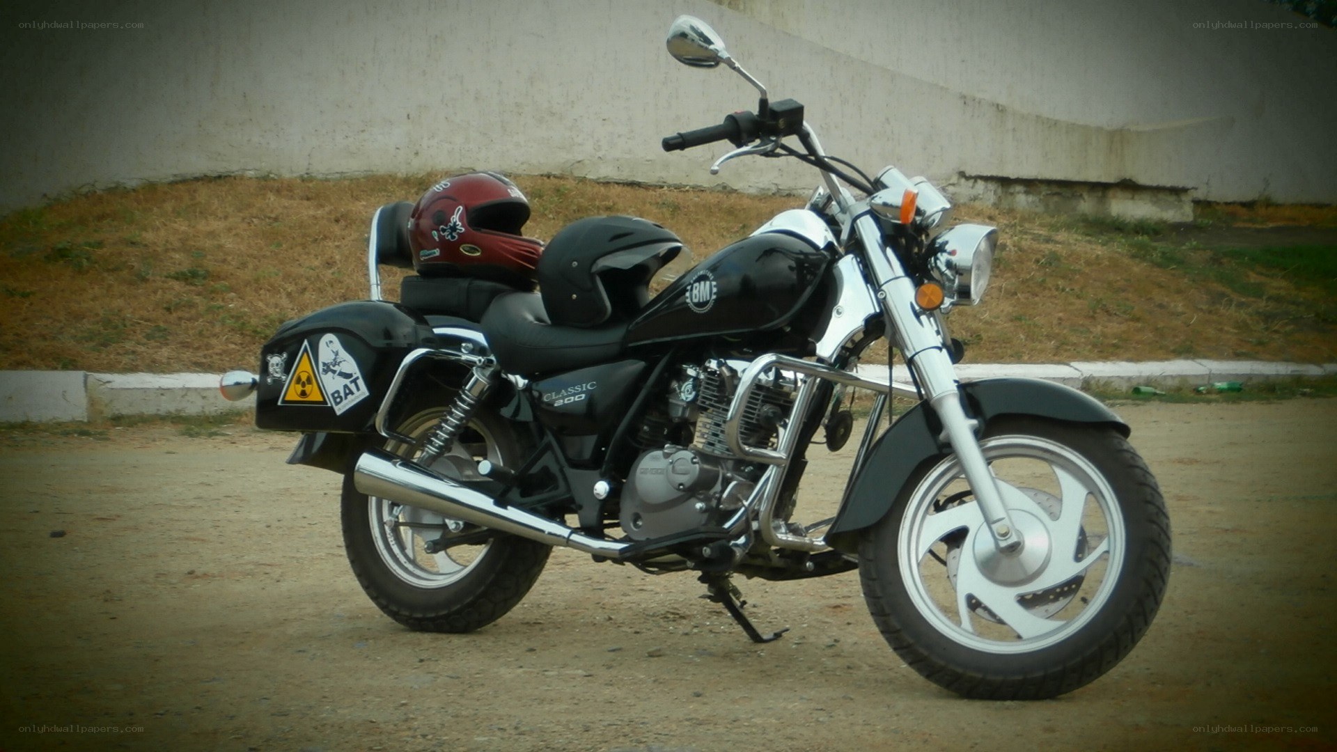 black motorcycle with helmet