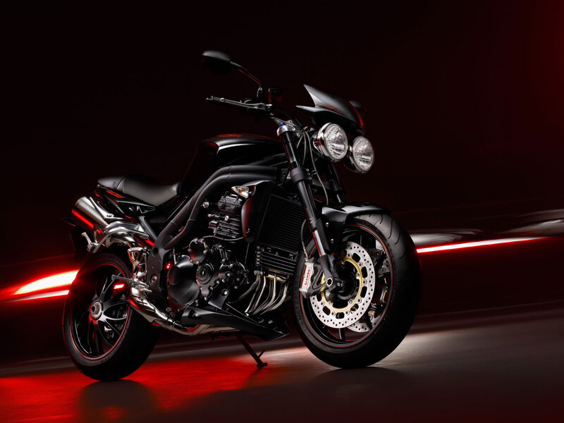 Black motorcycle with red lighting