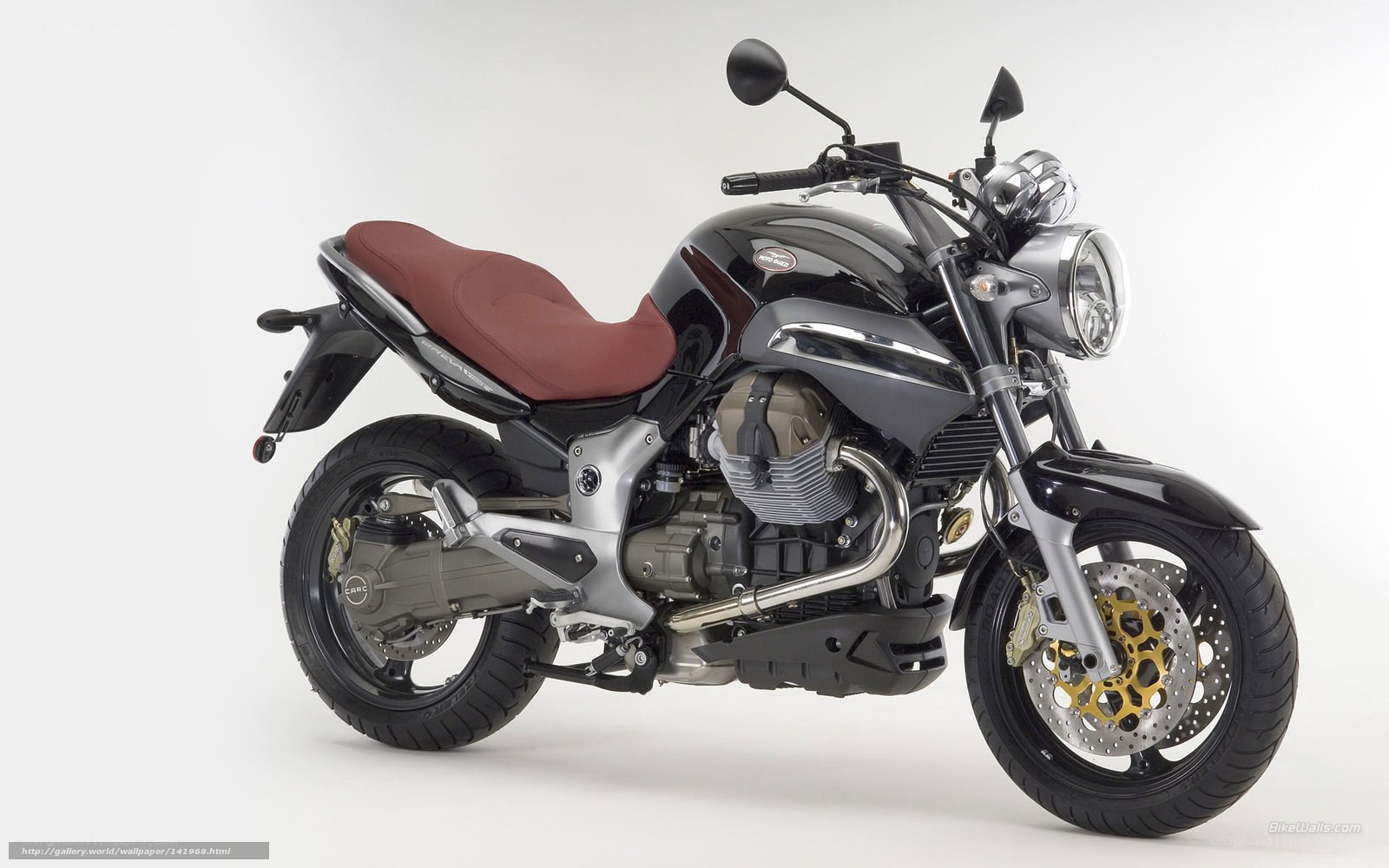 black motorcycle with red seat