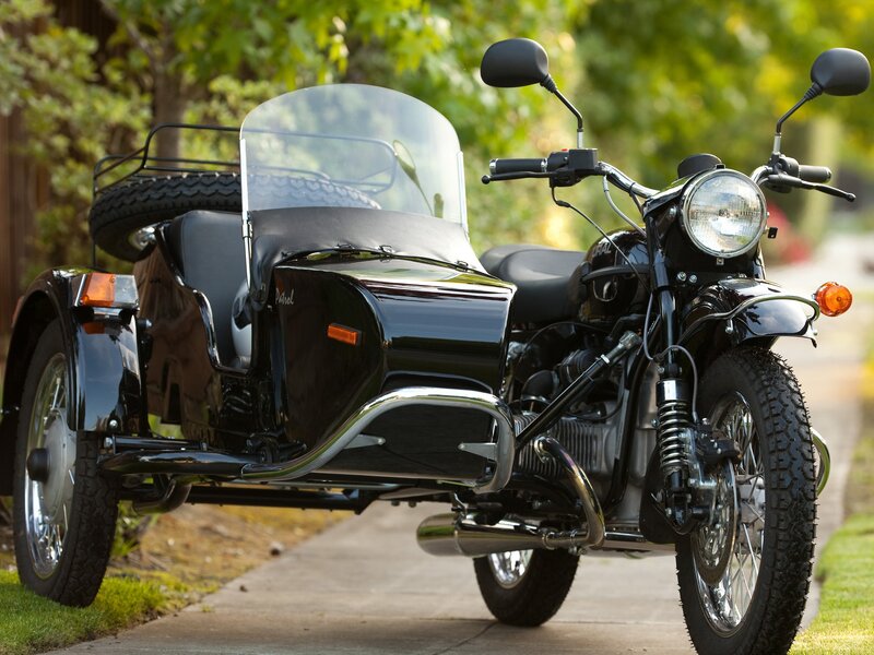 Black motorcycle with sidecar