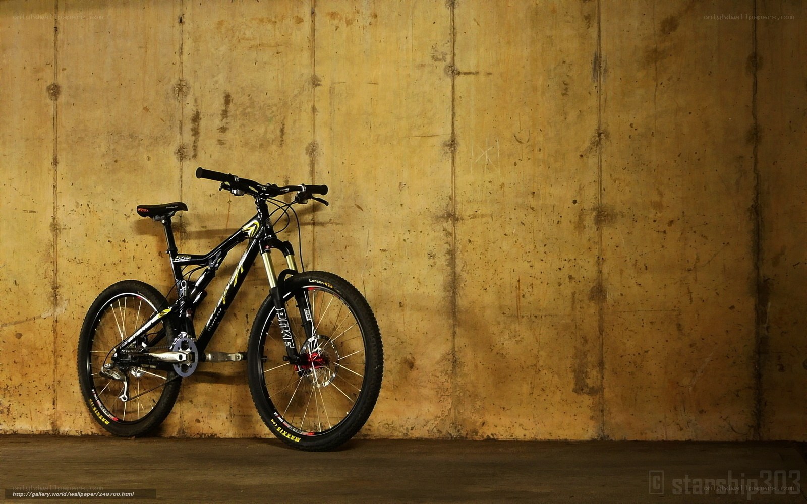 black mountain bike against wall