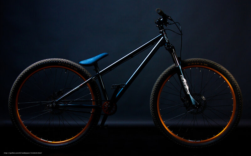 black mountain bike with blue seat