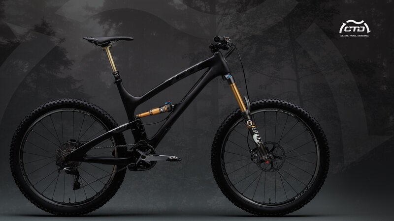 black mountain bike with gold suspension