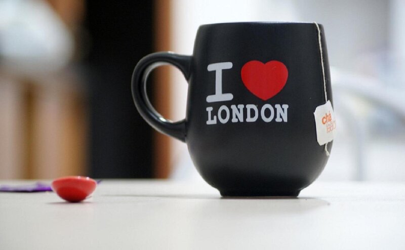 Black Mug with Tea Bag — Calm, Photograph