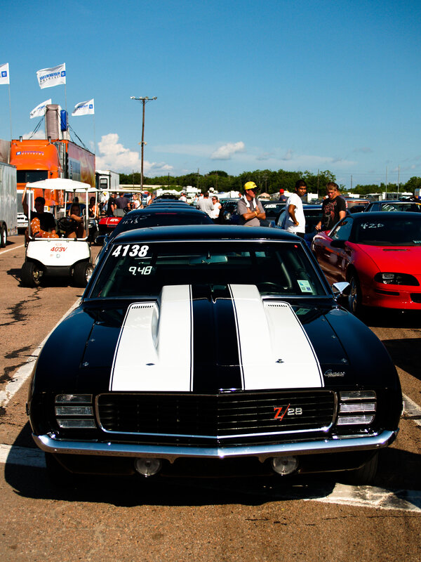 Black muscle car at a race event