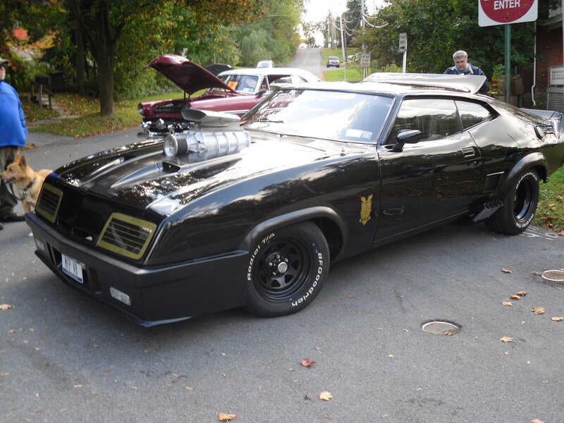 black muscle car at a show