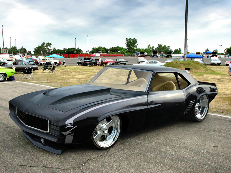 Black muscle car at a show