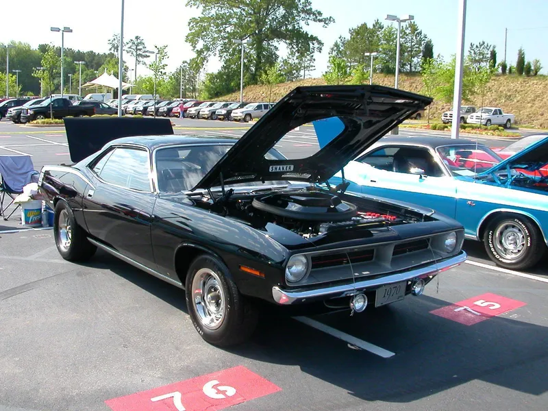 Black muscle car at a show