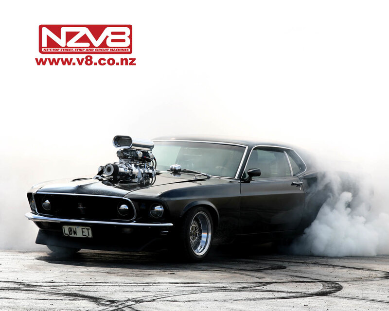 black muscle car burnout