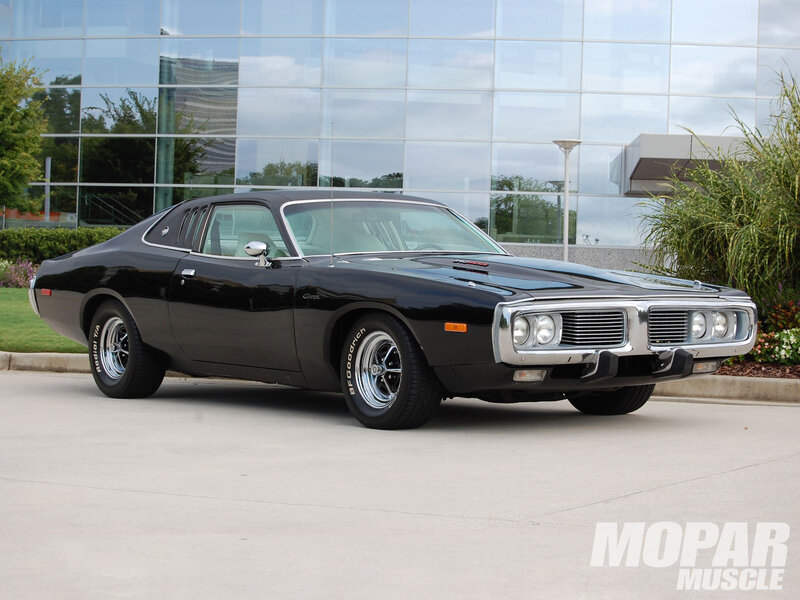 Black Muscle Car — Calm, Afternoon, Photograph, Building, Plants