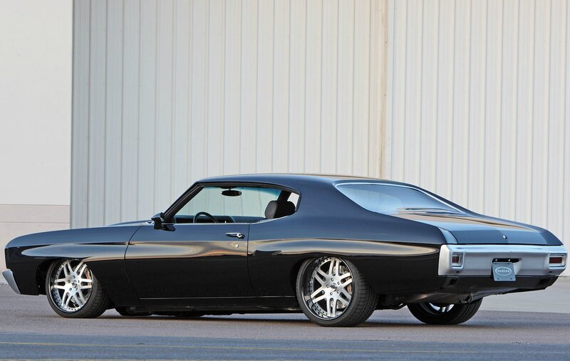 Black Muscle Car — Calm, Afternoon, Photograph, Building, Wheels