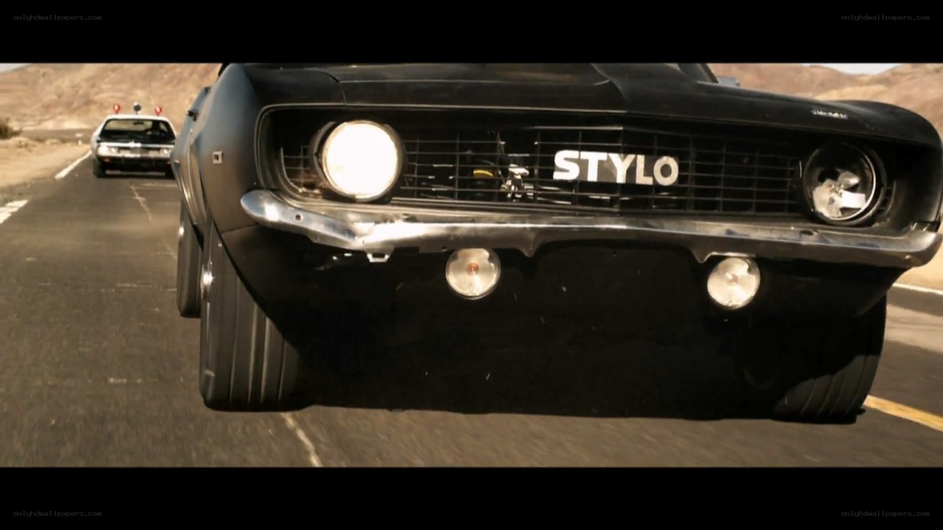 black muscle car chase