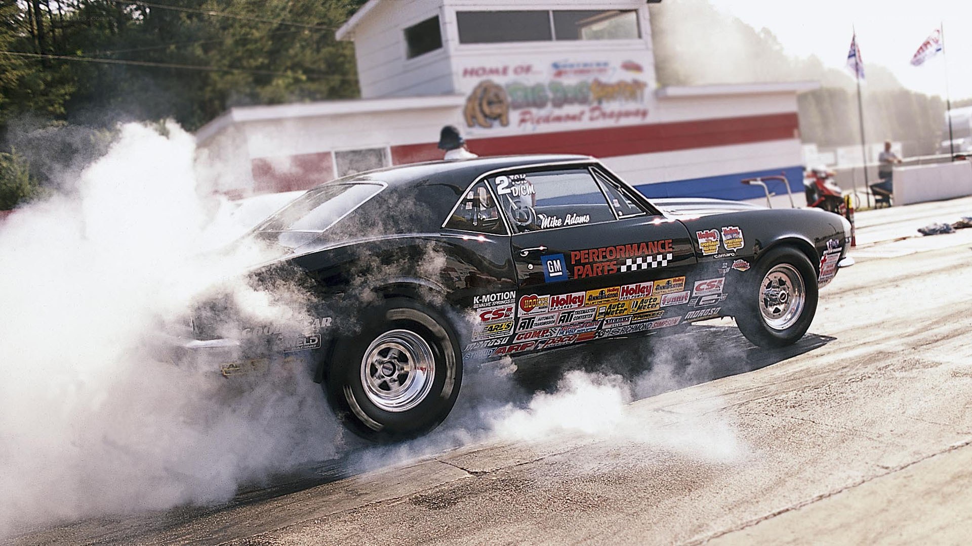 black muscle car drag racing