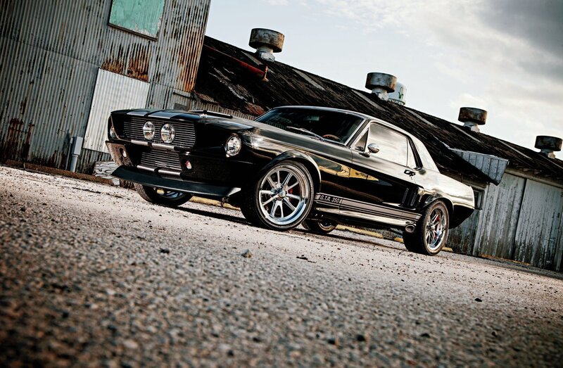 Black Muscle Car — Dramatic, Afternoon, Photograph, Building, Gravel