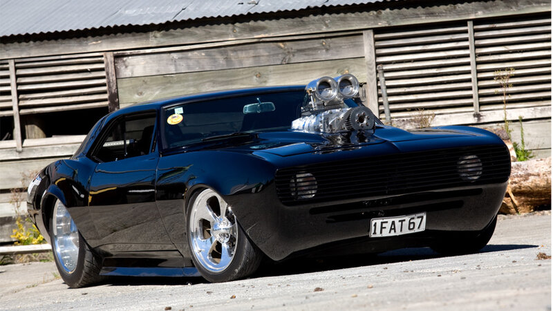 Black Muscle Car — Dramatic, Afternoon, Photograph, Building
