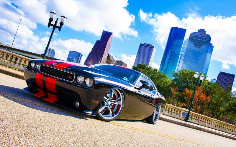 Black Muscle Car — Dramatic, Afternoon, Photograph, Skyscraper