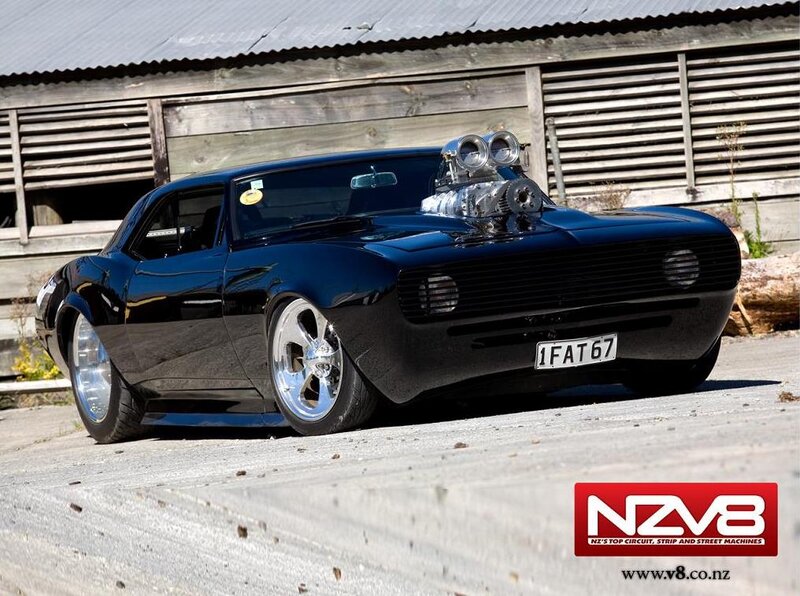 Black Muscle Car — Dramatic, Afternoon, Photograph, Wooden Building
