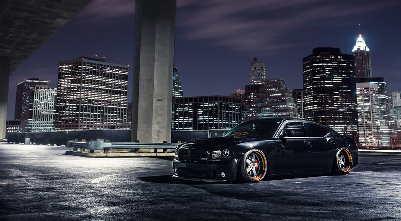 Black Muscle Car — Dramatic, Night, Photograph, City Skyline