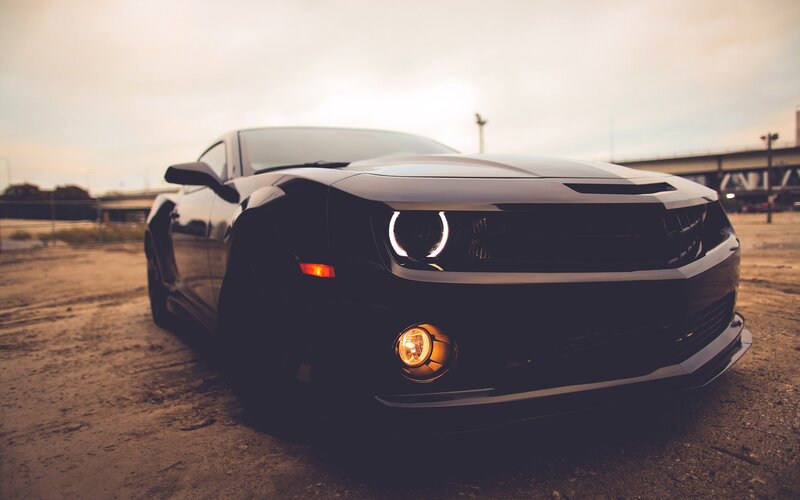 Black Muscle Car — Dramatic, Sunset, Photograph, Dirt Ground