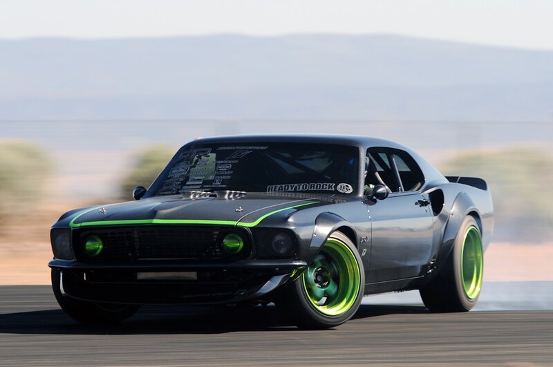 Black muscle car drifting