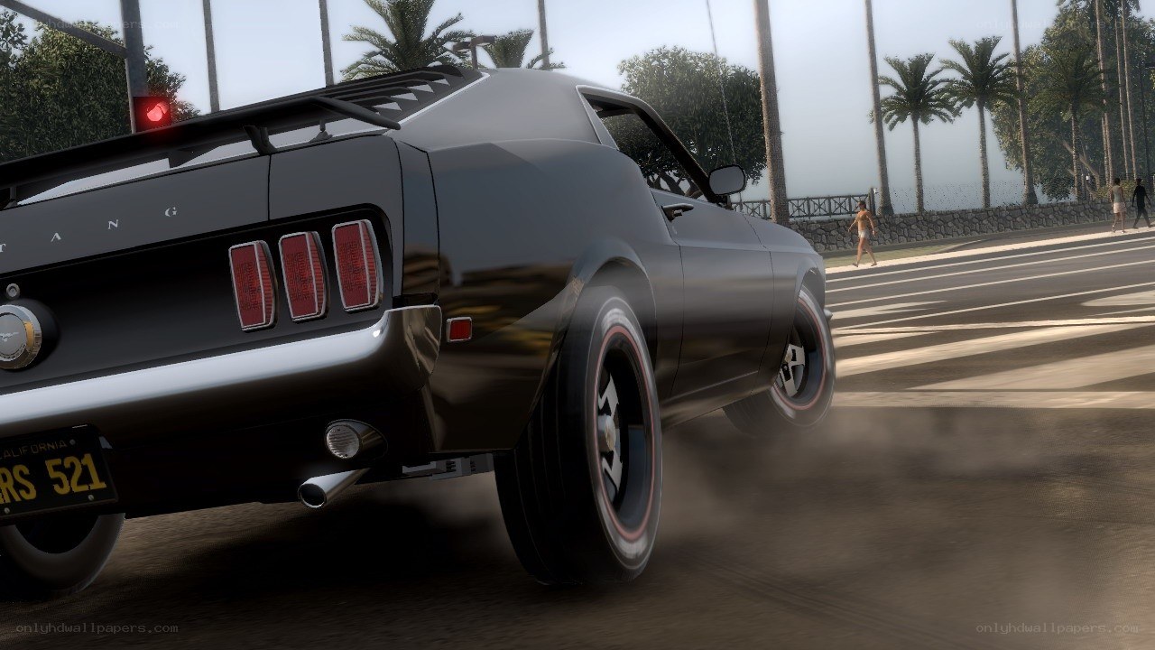 black muscle car drifting