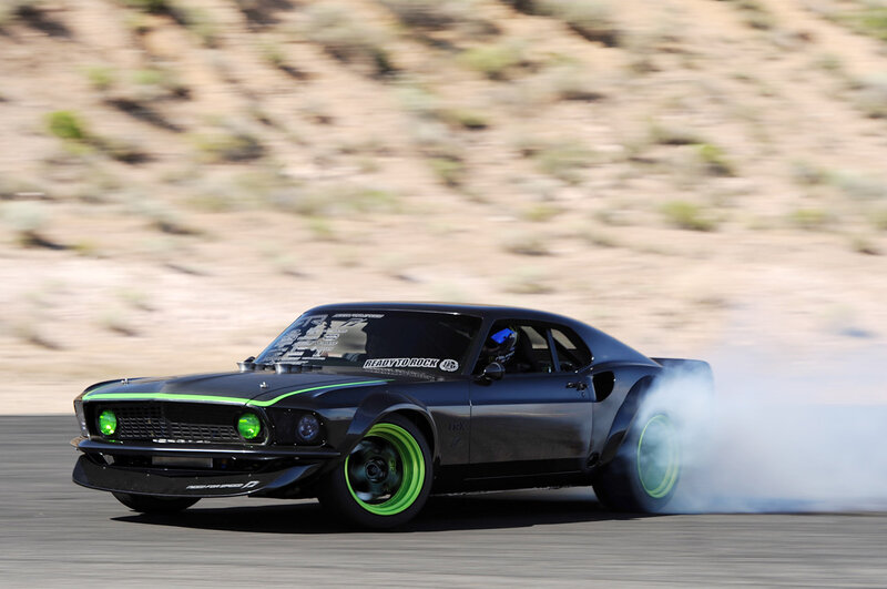 Black Muscle Car Drifting — Dynamic, Afternoon, Photograph