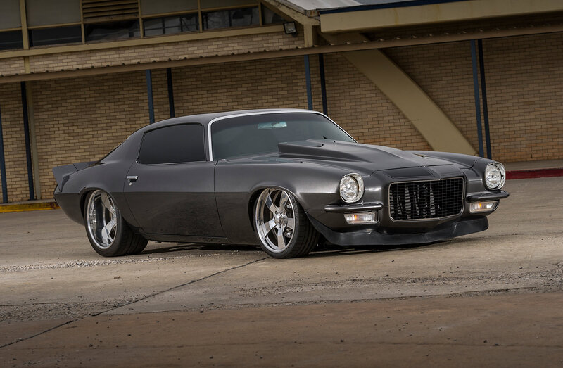 Black Muscle Car — Gray, Dramatic, Afternoon, Photograph, Brick Building