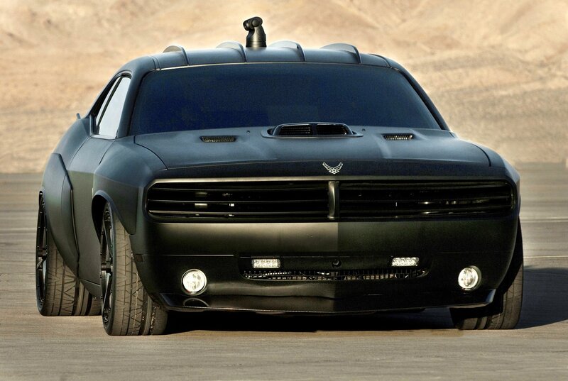 black muscle car in desert