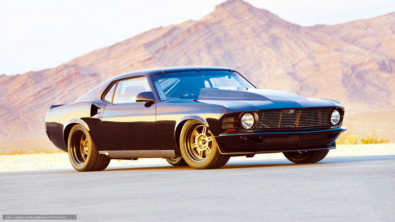 Black muscle car in desert