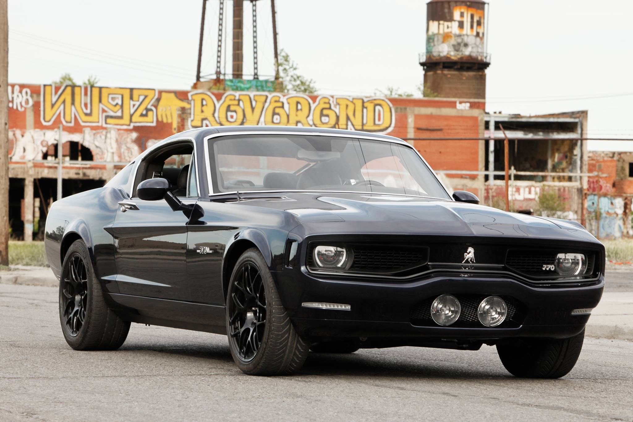 Black muscle car in urban setting