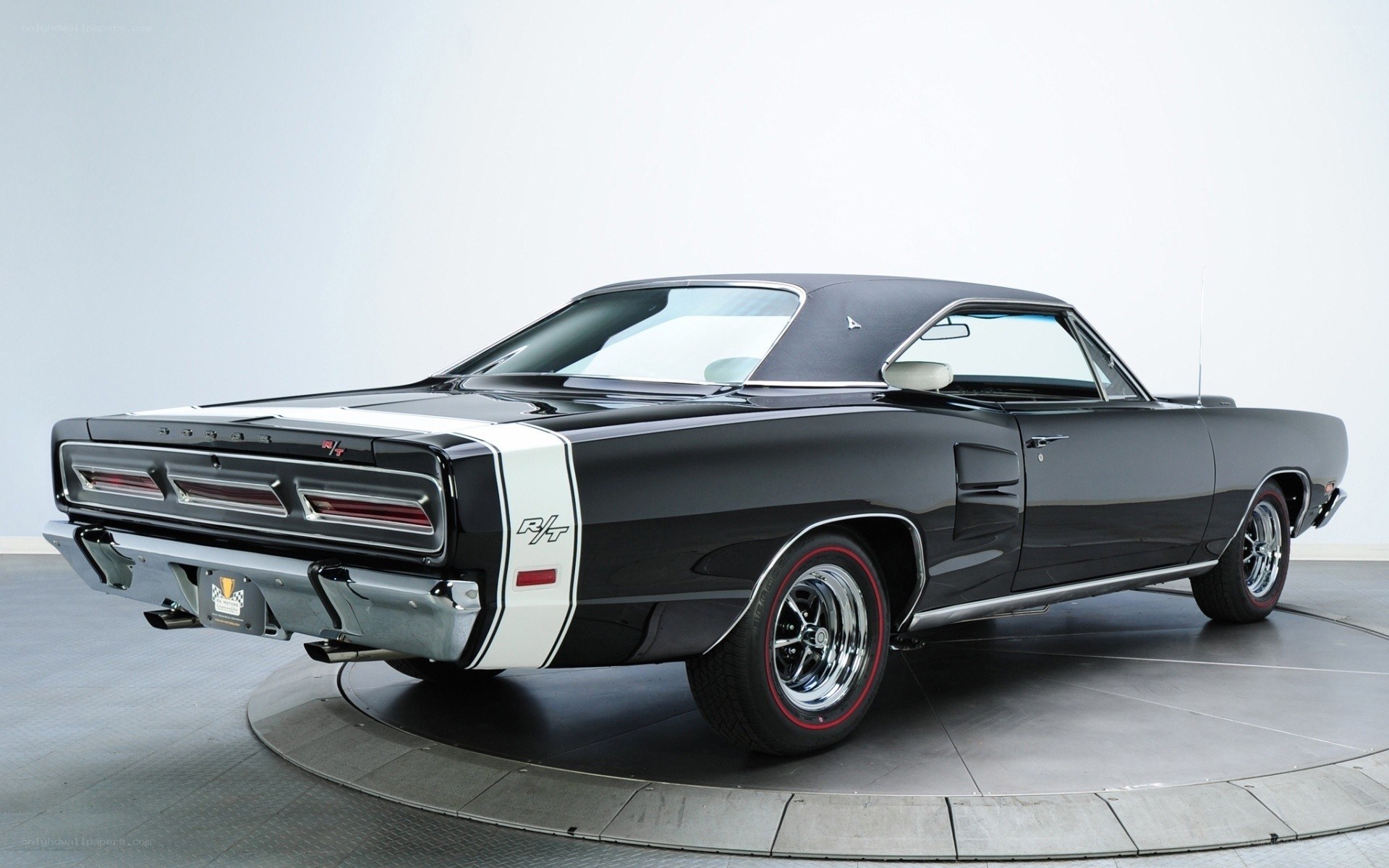 Black muscle car on display