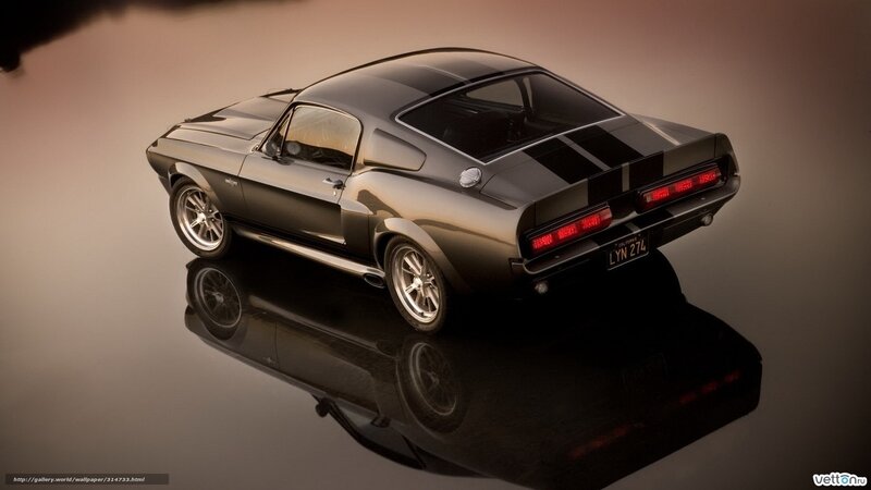 Black muscle car on reflective surface