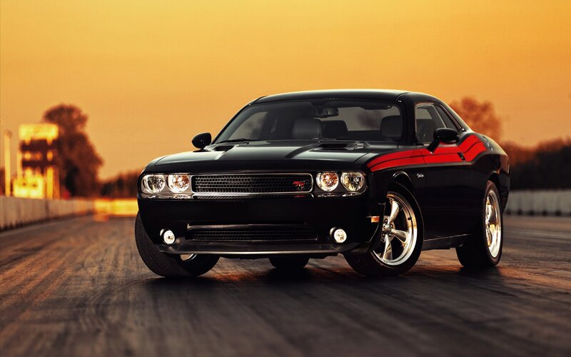 Black muscle car on track
