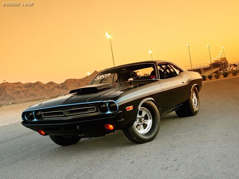black muscle car on track