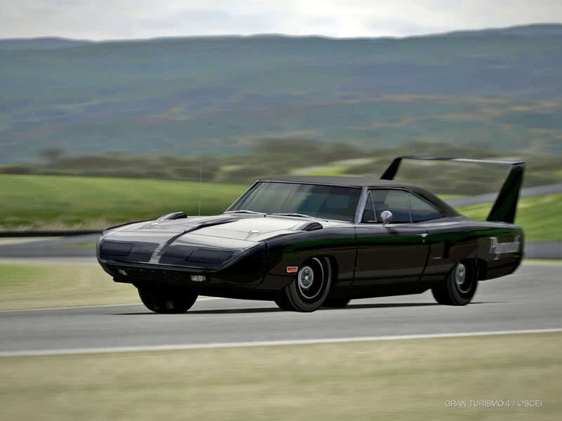 Black Muscle Car on Track — Dynamic
