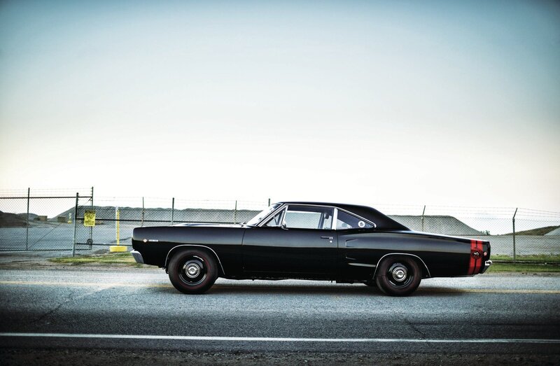 Black Muscle Car — Serene, Afternoon, Photograph, Fence