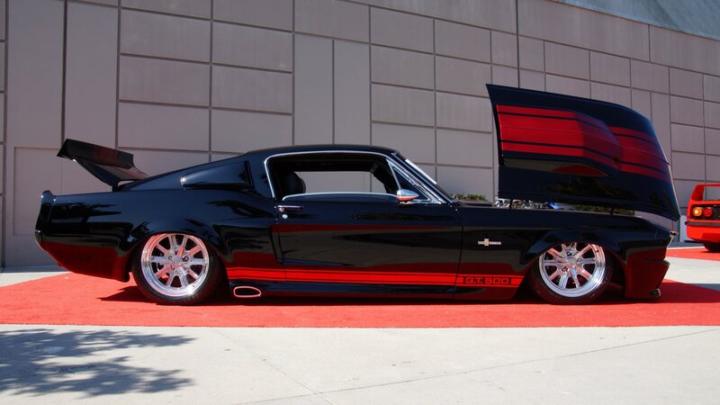 Black Muscle Car — Showcase, Afternoon, Photograph, Red Carpet, Building