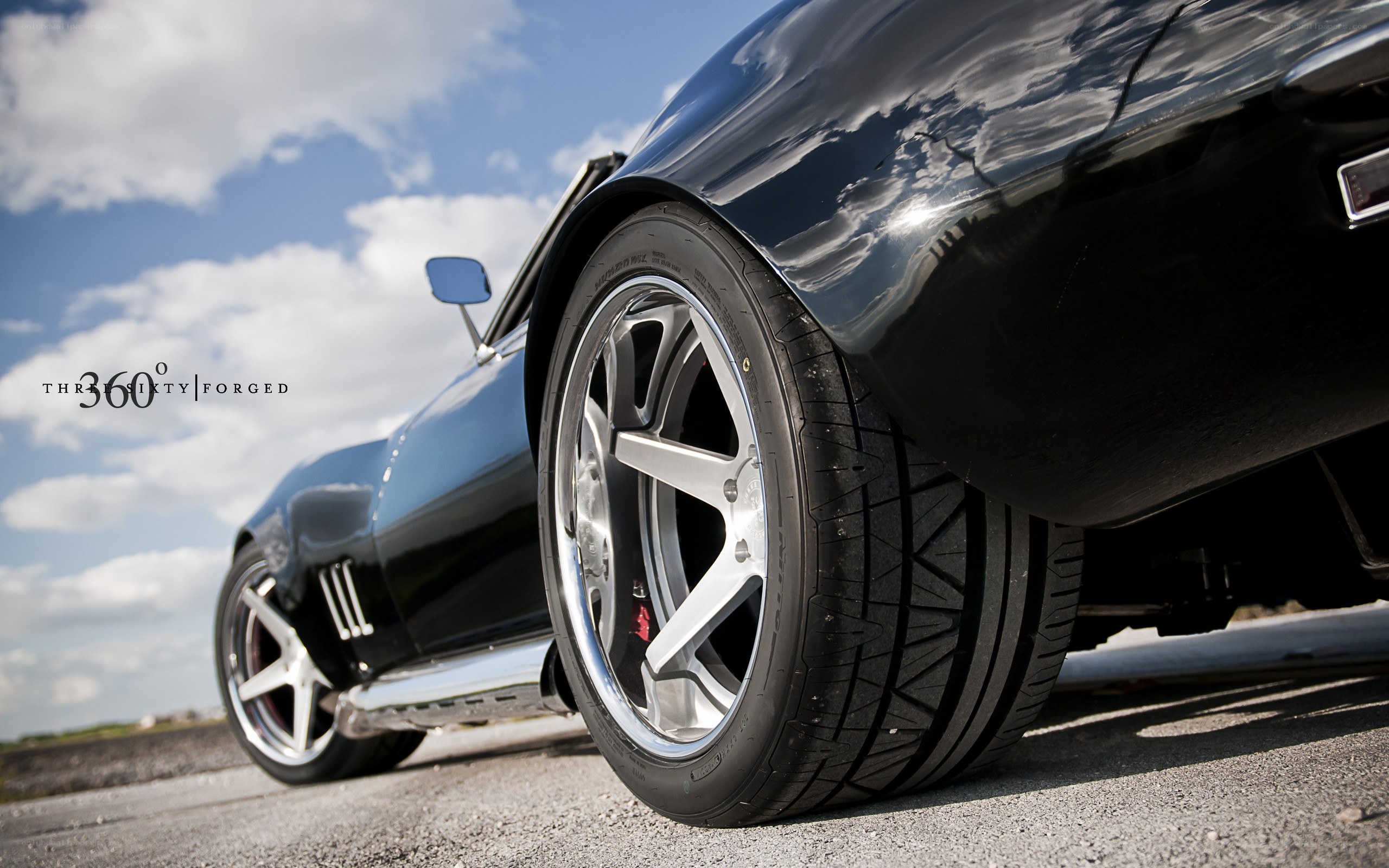 Black muscle car wheel