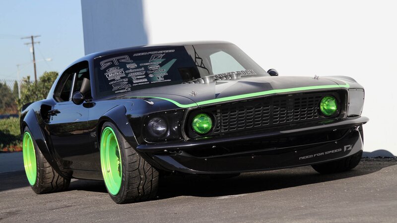 black muscle car with green accents