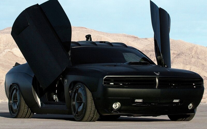 Black muscle car with gull-wing doors