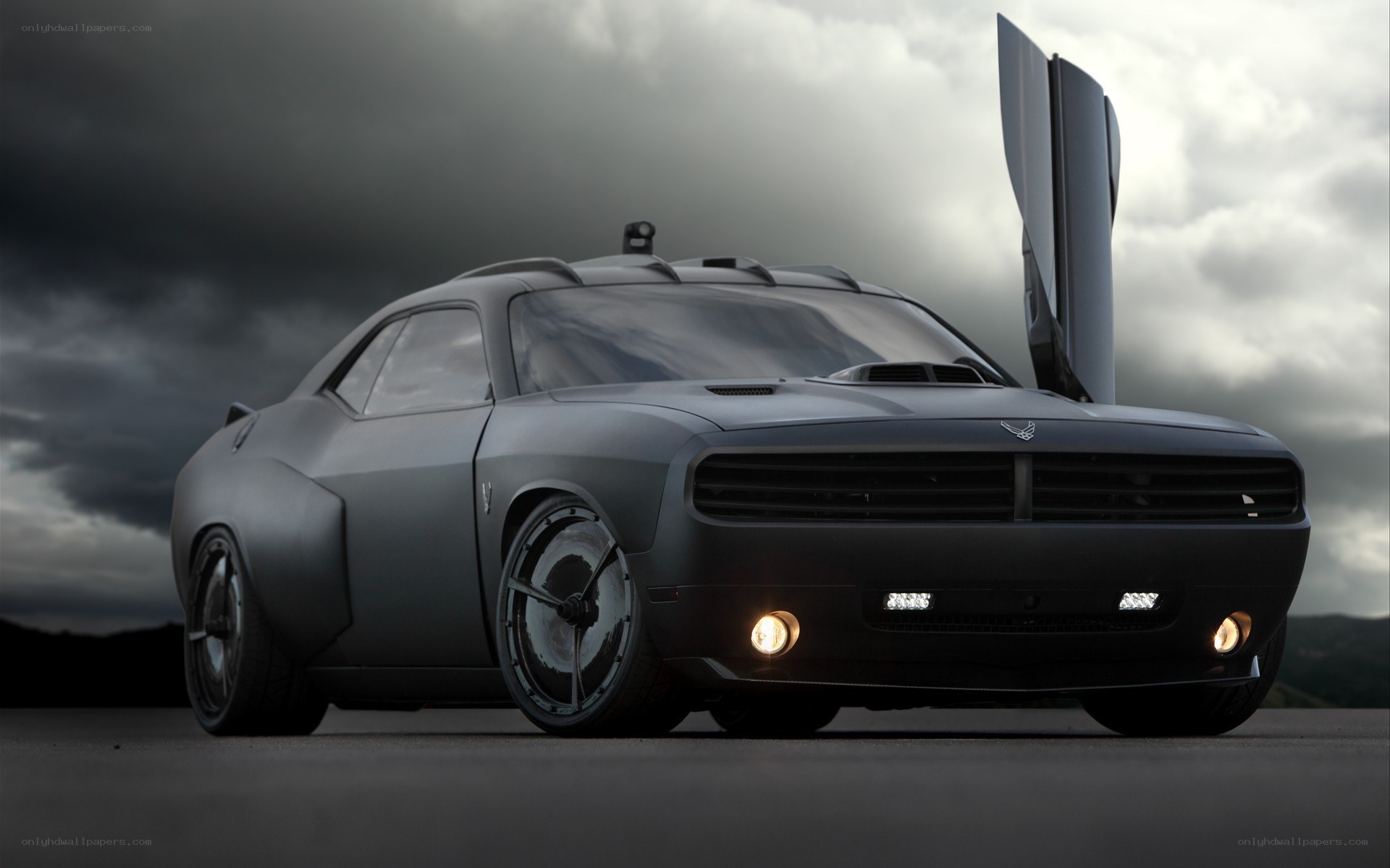 black muscle car with open door