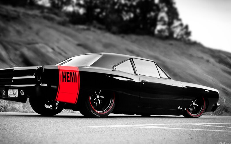 Black muscle car with red HEMI stripe