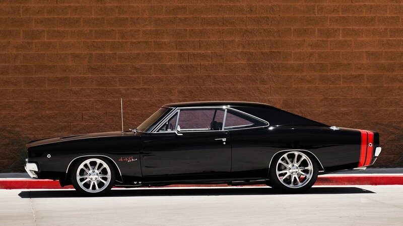 Black muscle car with red stripes