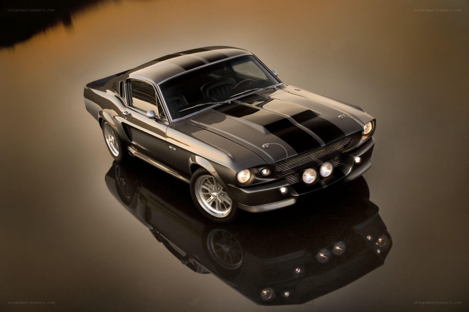 Black muscle car with stripes