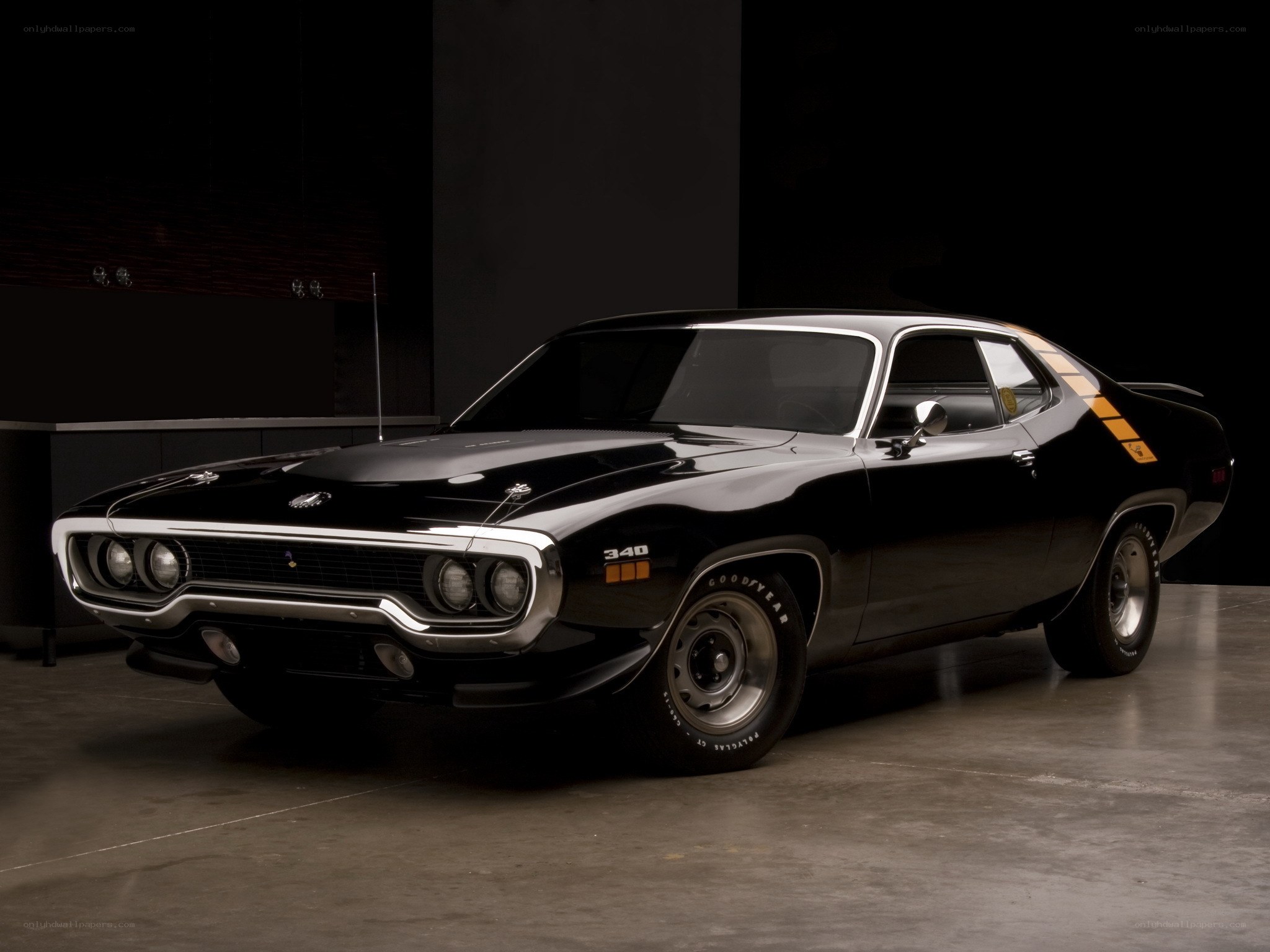 Black muscle car with stripes