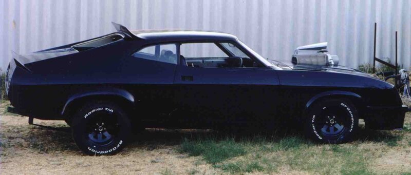 black muscle car with supercharger