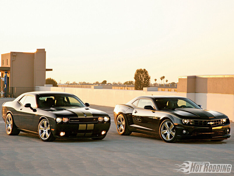Black muscle cars on rooftop