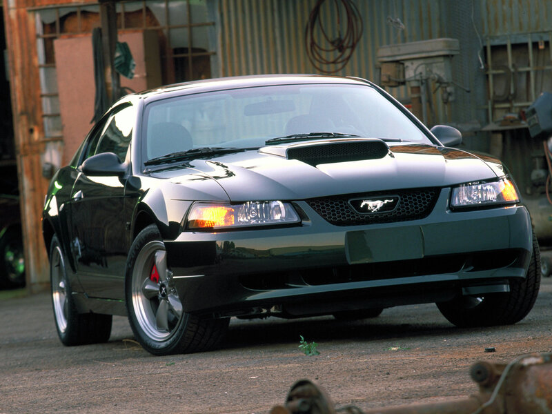 Black Mustang Car — Dramatic, Afternoon, Photograph, Building