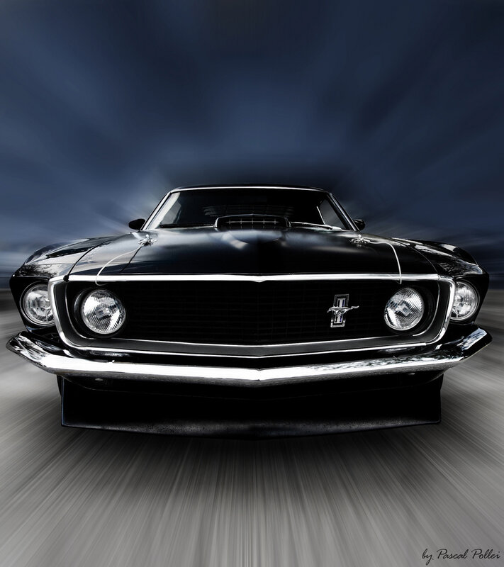 Black Mustang in motion
