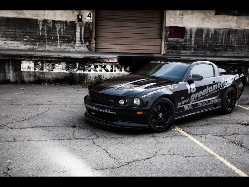 black mustang in parking lot